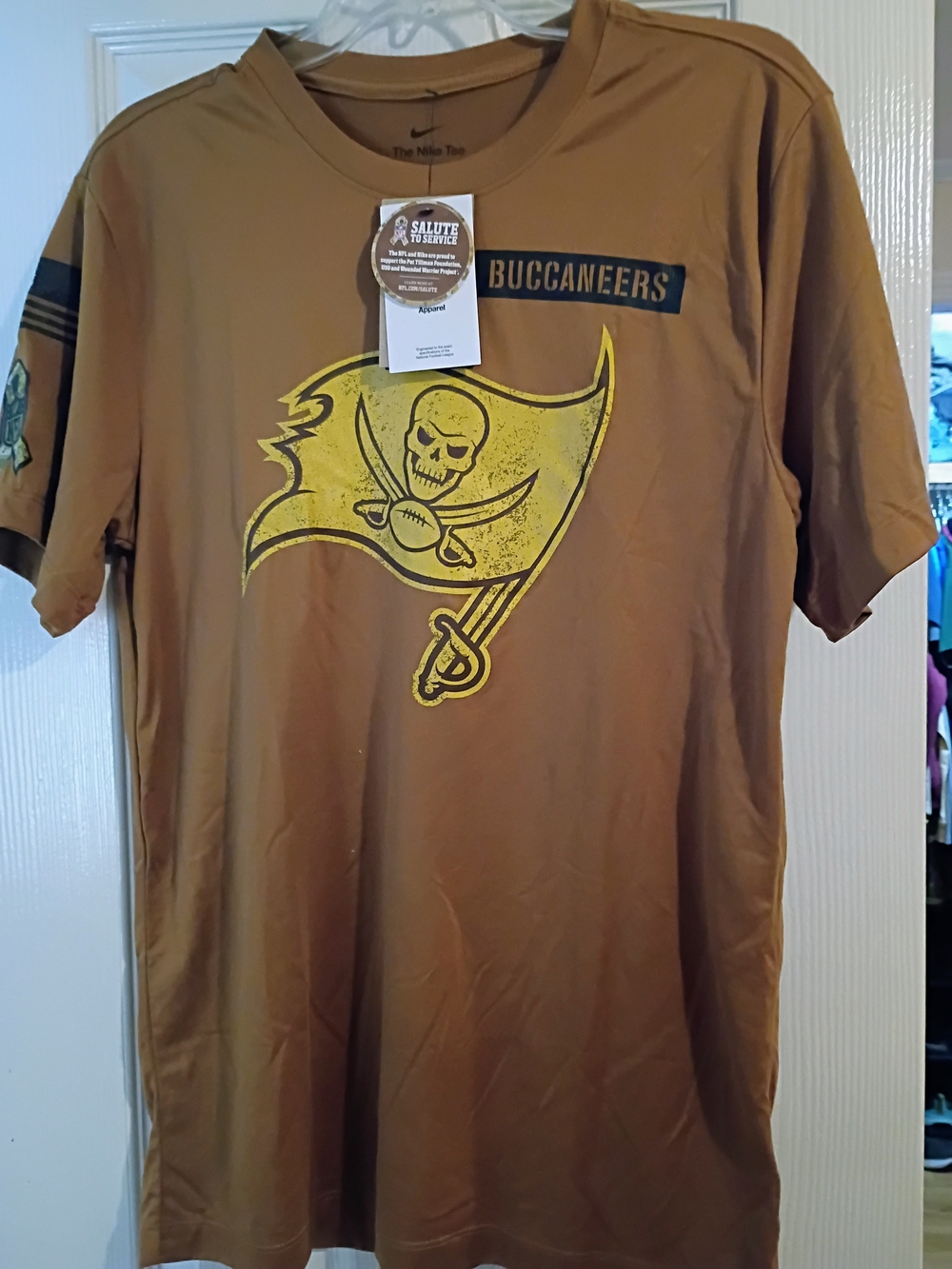 Nike Brown Short Sleeve Buccaneers Graphic Tee with Yellow Logo